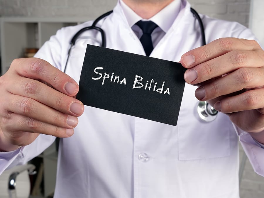 pemeriksaan janin dengan USG dapat membantu mendeteksi spina bifida.